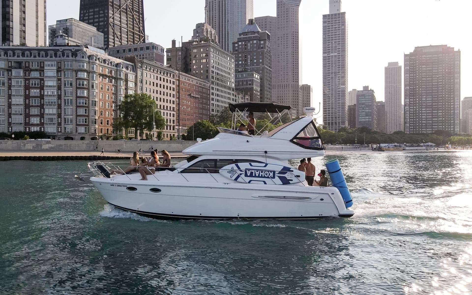 Miss Direction 34-foot Meridian yacht charter with downtown Chicago skyline views